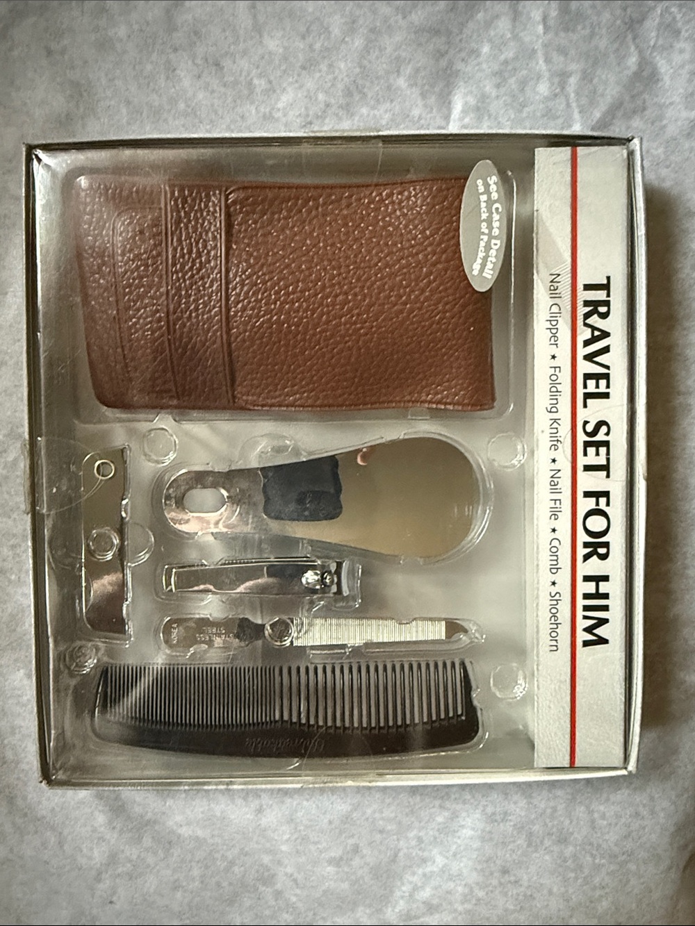 New in box Men's Travel Grooming Kit. Has never been removed.
